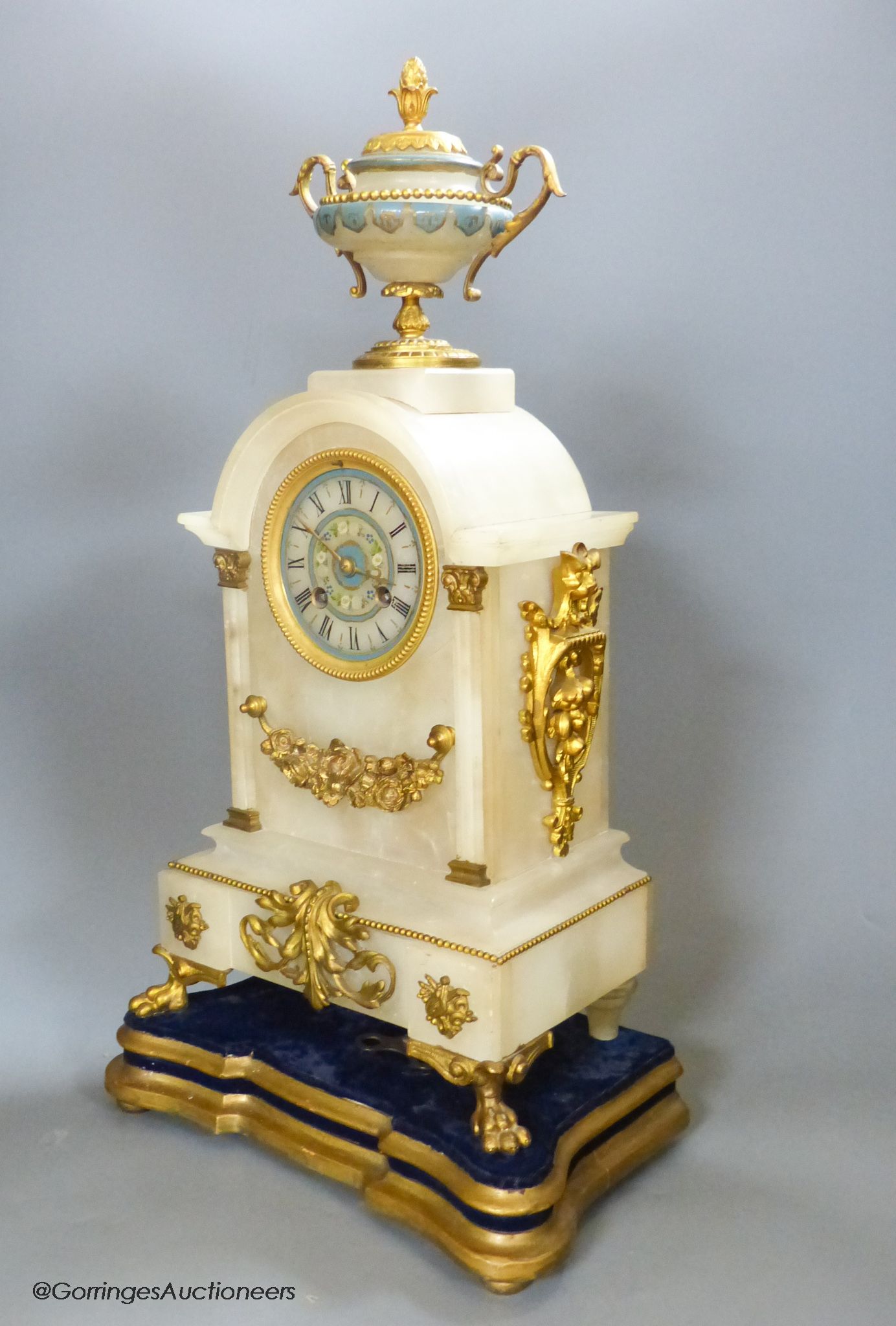 A 19th century French onyx mantel clock, overall height 49cm